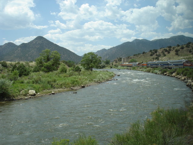 Arkansas River winding through the valley west of Canon City with the Royal Gorge Route train on the far bank